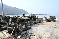 　大澳山08據點展示軍車因車體嚴重鏽蝕而無參觀價值，已拆解成廢鐵準備運台。（圖／文：陳鵬雄）
