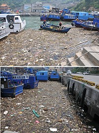 白沙碼頭出現大量海漂垃圾,港務機關僱用人員加以清除。(圖/文:陳鵬雄)