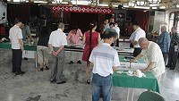 福州市老年大學等一行組成藝文團與中華璞舍藝文協會在北市舉行兩岸藝文觀摩文流,兩岸大師當場揮毫。(圖:中華璞舍藝文協會提供)