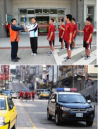 102年全中運聖火傳遞,馬祖是離島第一站,昨天由教育局長邱金寶代表接下聖火,交由角力隊組成的聖火隊,在警車前導下順利完成馬祖的聖火傳遞任務。(圖/文:劉秋月)