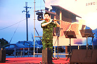 北指部弟兄陳弘道受邀表演中國笛,讓觀眾聽得如癡如醉。(圖/文:呂則賢)