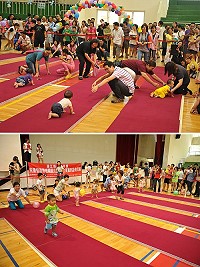「活力寶寶趴趴走競賽」歡樂登場,爬爬樂比賽時,家長使出渾身解數吸引小寶寶向前爬,搬搬樂也是讓家長又期盼又心疼;現場也運用學前檢核表透過闖關活動設計進行兒童發展篩檢。(圖/文:曹重偉)