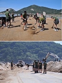 嚴重積沙的塘后道在軍民各界全力清除兩天後,昨天下午終於恢復正常。(圖/文:陳鵬雄)