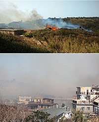 東莒火燒山,因廠商施工焊具零星火花,引燃芒草堆引起火災事故,村莊籠罩在煙霧中,東莒消防分隊及義消大隊花了90鐘左右才全面撲滅火勢。(圖/文:林冰芳、圖/王建華提供)