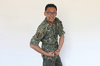 認真工作的哲良帥氣十足。(圖/文:邱毓凱)