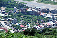 　塘岐中正路後方有廣達15000平方公尺的都市計畫住宅區用地，但沒有道路讓這片空地無法增值再利用。（圖／文：陳鵬雄）
