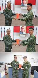 指揮官頒發陳家祥、王格宗、林言工作獎金。(圖/文:謝承翰)