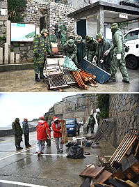 　107年北竿國清週計畫芹壁村率先開跑，軍民工作人員冒著寒風細雨完成任務。（圖／文：陳鵬雄）