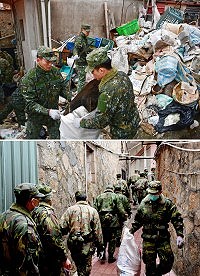 　民眾檢舉介壽村3XX號附近堆放大量垃圾，經現勘果然發現超過10噸的廢棄物，2日先配合國清週支援兵力進行清理，阿兵哥以接龍方式搬了一個上午還搬不完。（圖／文：曹重偉）