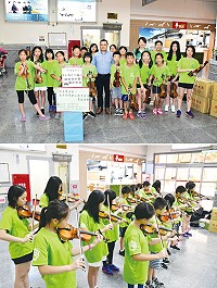 把愛傳出去-南竿鄉學童小提琴義演募款活動,29日下午在南竿機場大廳悠揚登場,由王筱君老師率中正國中小小提琴社學員們,賣力向來往的旅客鄉親們演奏動人樂章。(圖/文:曹重偉)