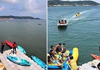 海洋多元推廣親子體驗活動30日在救生大隊碼頭歡樂登場,獨木舟、腳踏船、天鵝船、香蕉船、橡皮艇等,全部都可以免費暢玩,吸引一波接一波的鄉親排隊要下水清涼一下。(圖/文:曹重偉)