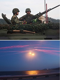 (上圖)CM21甲車50機槍實施射擊前整備。(下圖)火網交織劃破塘后澳天際。(圖/文:謝佳宏)
