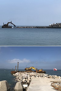 白沙北堤延伸持續拋石,已有約20公尺堤面在滿潮時出水。(圖/文:陳鵬雄)