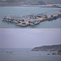 入秋首波鋒面南下,海上風浪增強,在馬祖海域作業的台籍漁船相繼駛到東引中柱港與西引島清水澳避風,數量達4、50艘之多。靠港停泊的漁船,這時也不忘作生意,販賣透抽、小卷等漁獲給餐館業者及百姓。(圖/文:陳其敏)