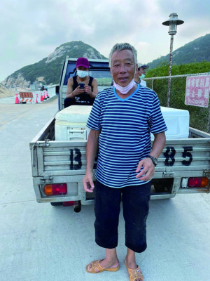 捕魚達人王國清先生。