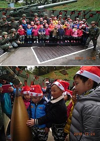 (上圖)全體師生與240砲合影。(下圖)小朋友興奮與240榴彈合影。(圖/文:陳怡芬)