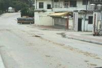 環保局近日加強查緝汙染路面,各重點路段確實有泥沙沾滿路面的情況發生。(圖/文:曹重偉)